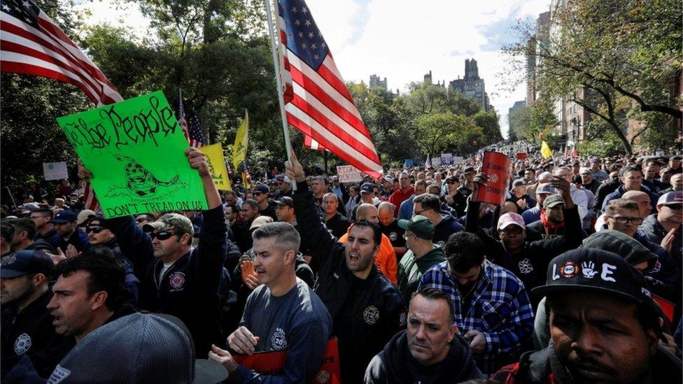 New York City Fire Department (FDNY) union members, municipal workers and others demonstrate during a protest against the city"s COVID-19 vaccine mandates on Manhattan"s Upper East Side in New York City, New York, U.S., October 28, 2021.