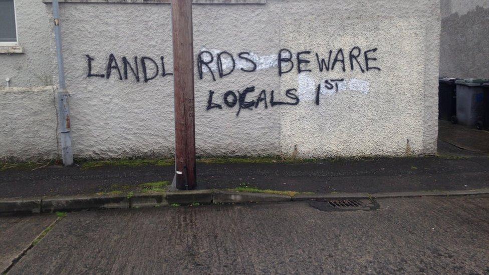 graffiti says Landlords beware locals first