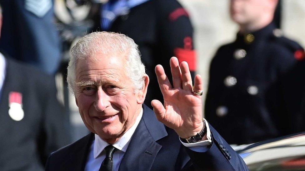 King Charles waved to members of the public outside St Anne's Cathedral