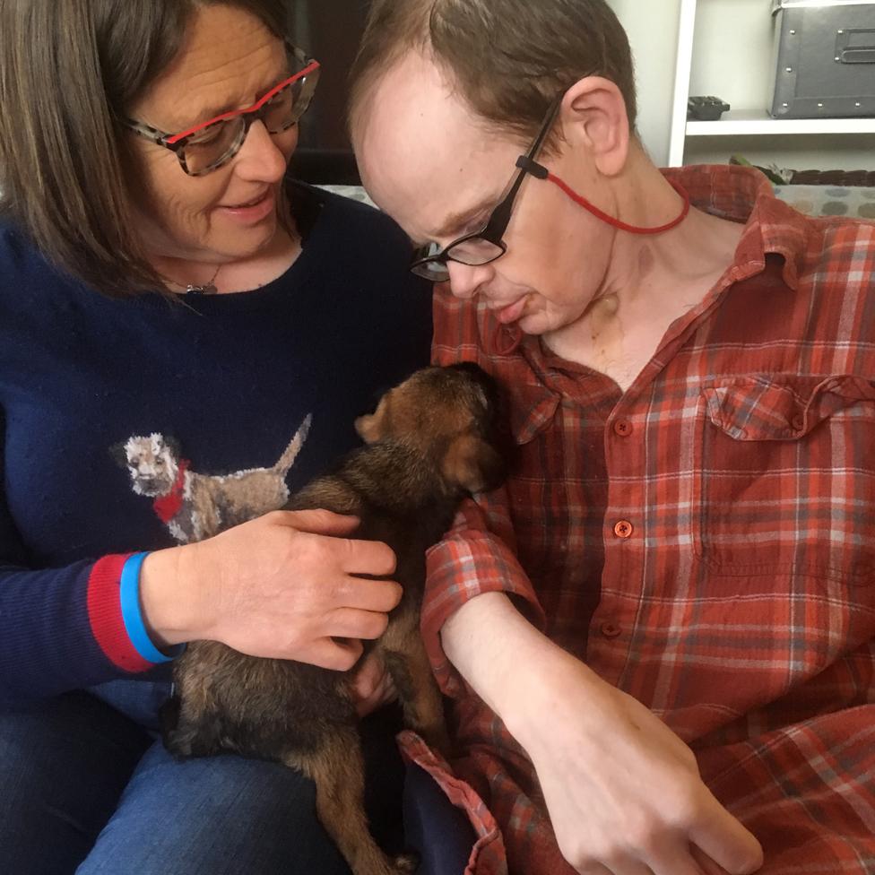 Jackie and her brother Mark and her new puppy