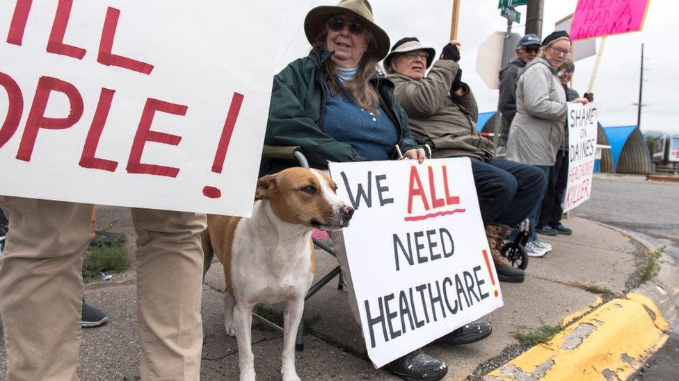 Protesters hold a small peaceful demonstration in support of health care on September 23, 2017 in Livingston, Montana