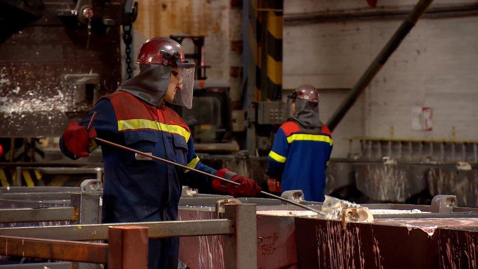 Workers at the Fort William aluminium smelter