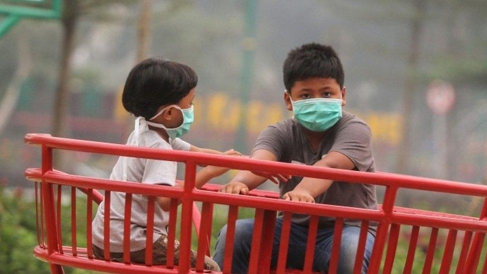 Children in Indonesia with face masks