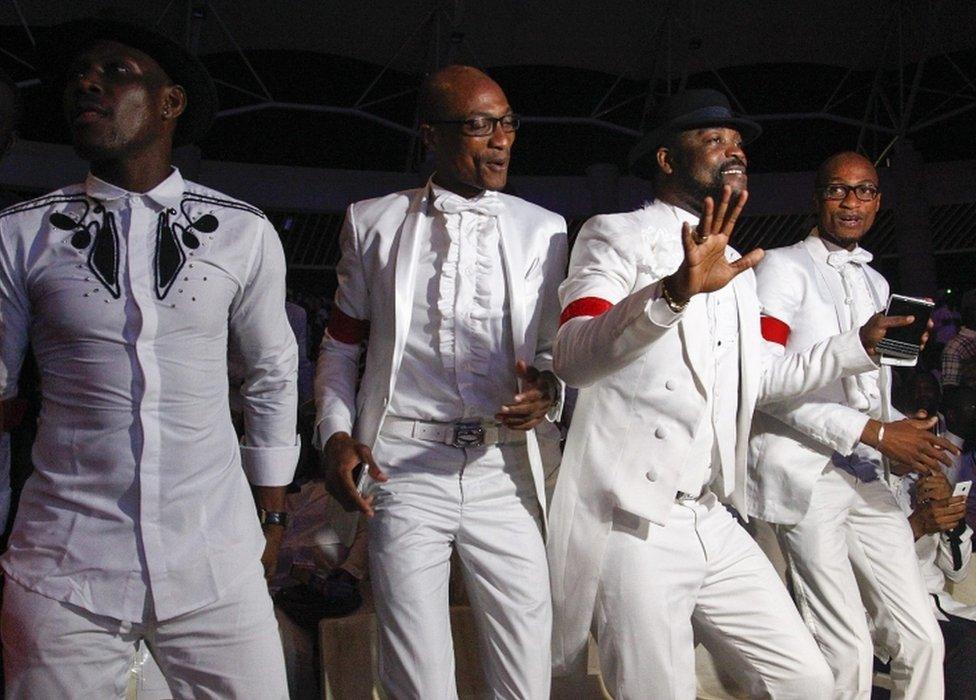 A photograph made available on 28 April 2016 showing fans dancing during the tribute concert for Papa Wemba at the Palace of Culture in Abidjan, Ivory Coast, 27 April 2016