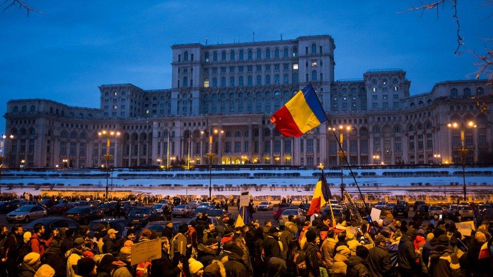 People march in front of the Romanian parliament during a rally against the government"s contentious corruption decree on February 4, 2017, in Bucharest, Romania