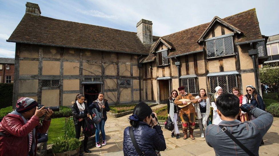 Tourists visiting the house in Stratford-upon-Avon where Shakespeare is thought to have been born