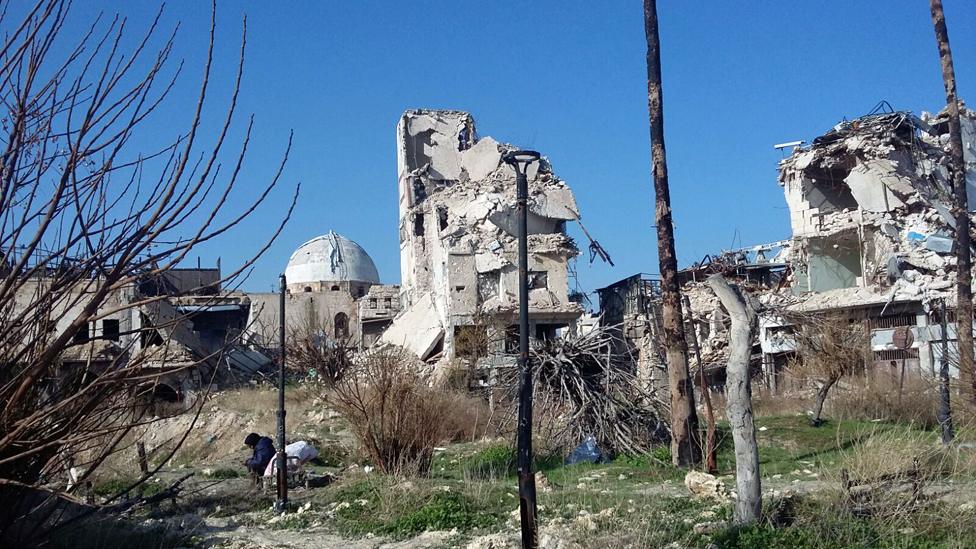 homeless people sleep in the ruins