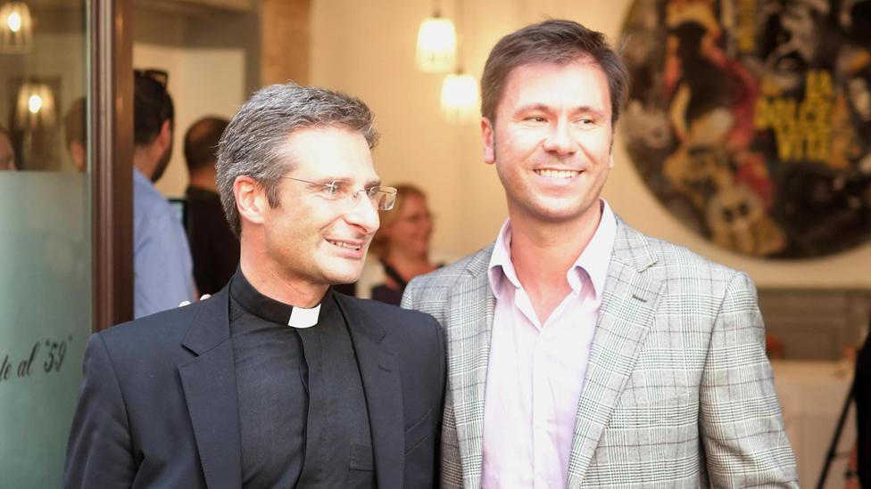 Monsignor Krzysztof Charamsa, second secretary of the Vatican's International Theological Commission, with his partner Eduard leaves after a press conference in Rome, Italy, 03 October 2015