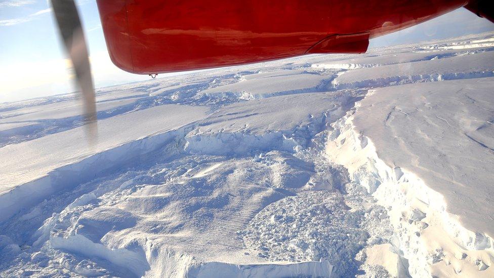 View across Antarctica with part of plane in view