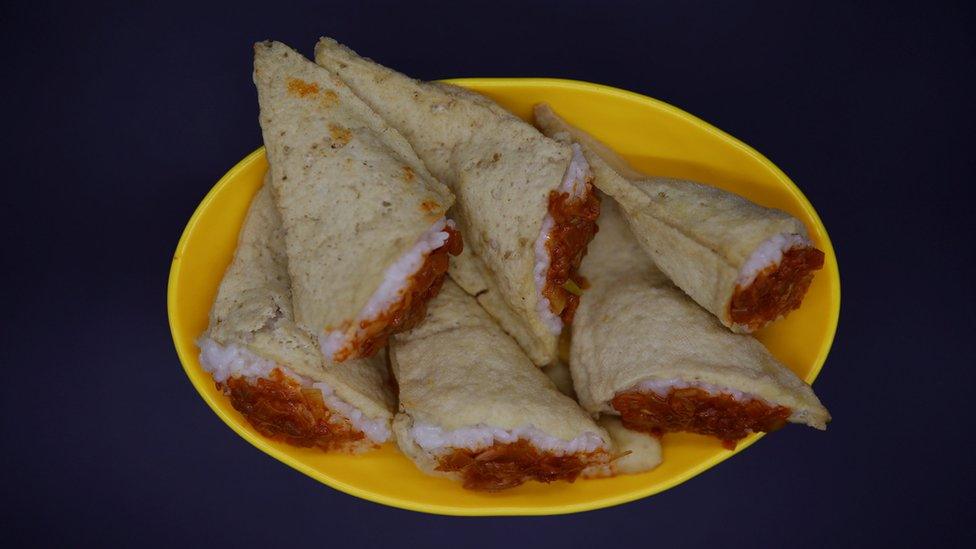 A photo illustration shows "dububab", which means rice in tofu skins, at a North Korean food store run by North Korean defector Hong Eun-hye in Seoul, South Korea, 28 September 2017.