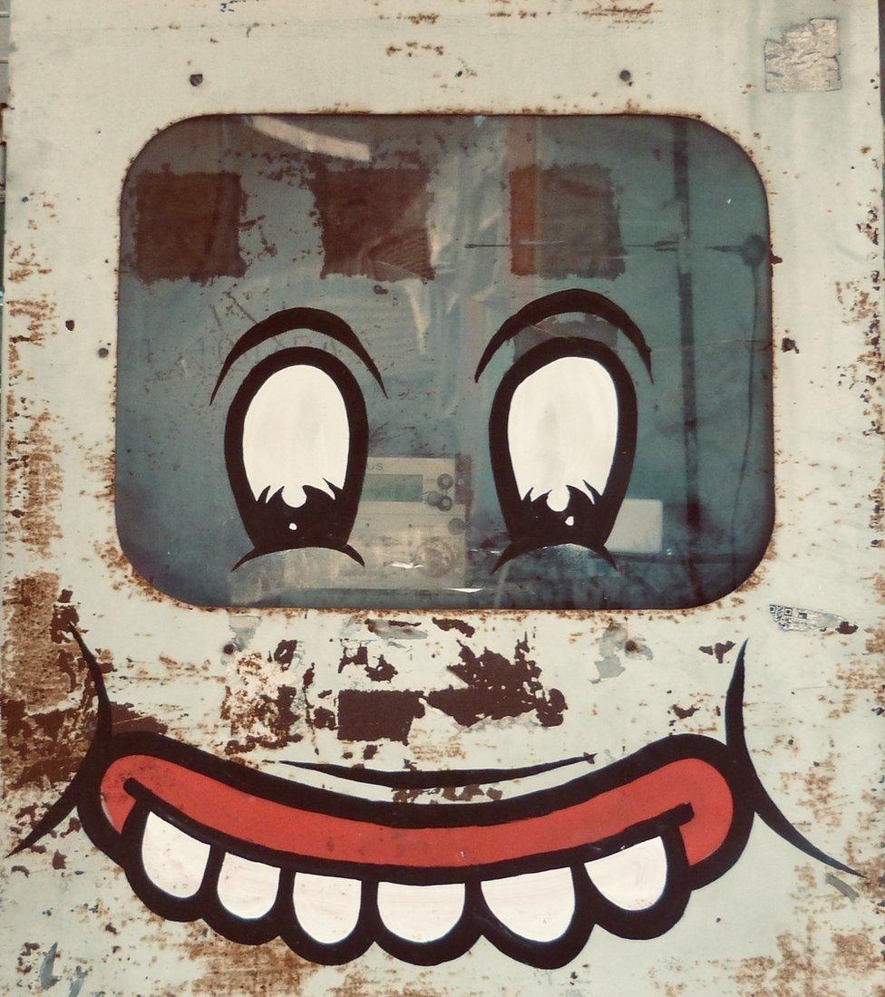 A face on an electricity box in Indonesia