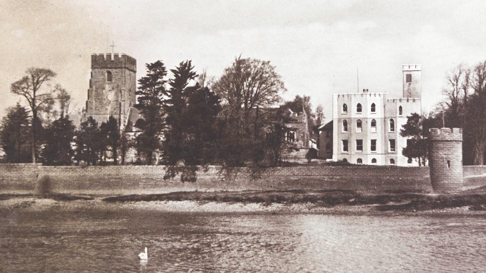 A postcard of Cardigan hospital and church