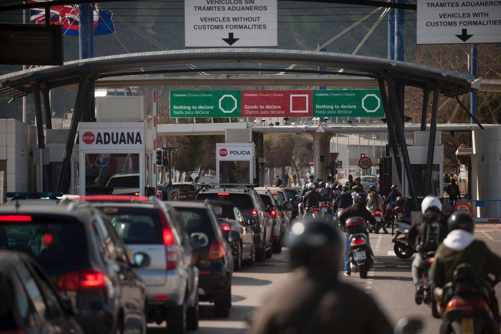 Cars queue on the Gibraltar side of the Spanish border