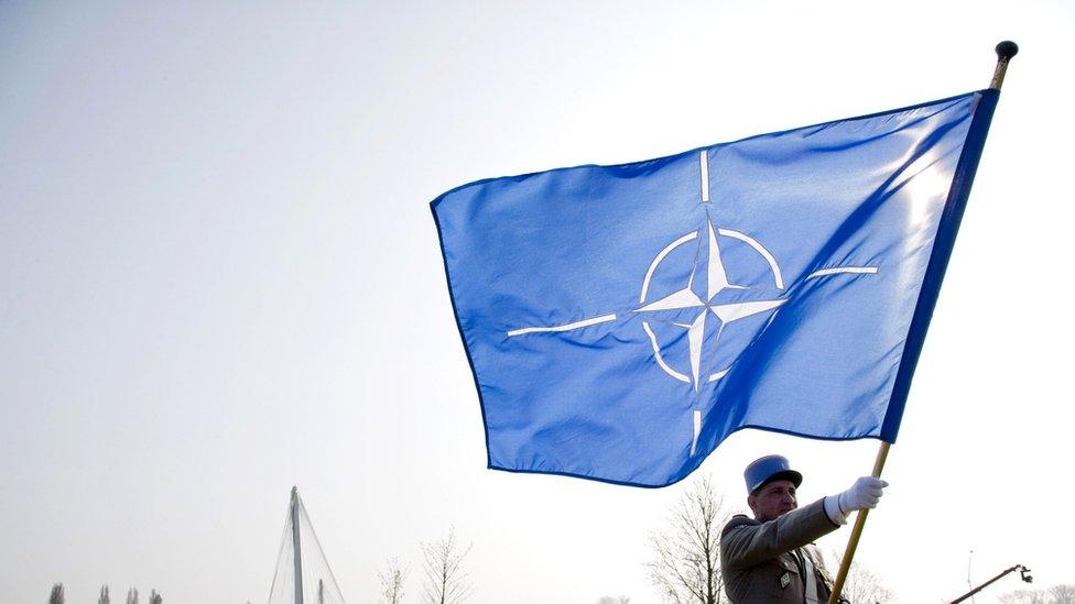 A Nato flag at the organisation's summit in 2009