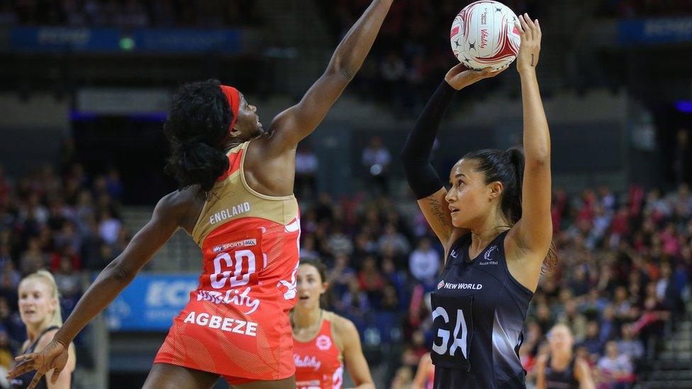 This is a photo of England netball captain Ama Abageze playing defence against New Zealand.