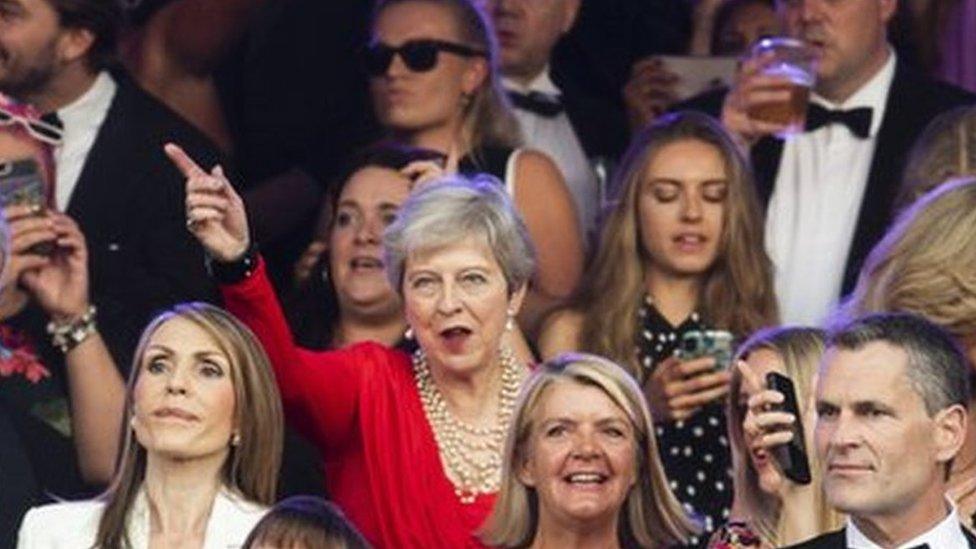 Theresa May dancing