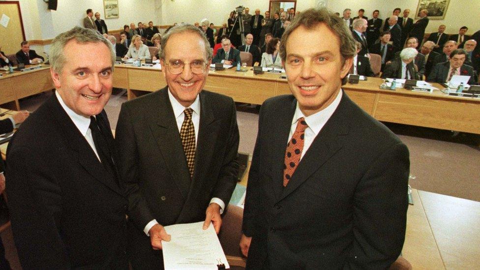 George Mitchell with the Irish and British PMs as the GFA was signed in 1998