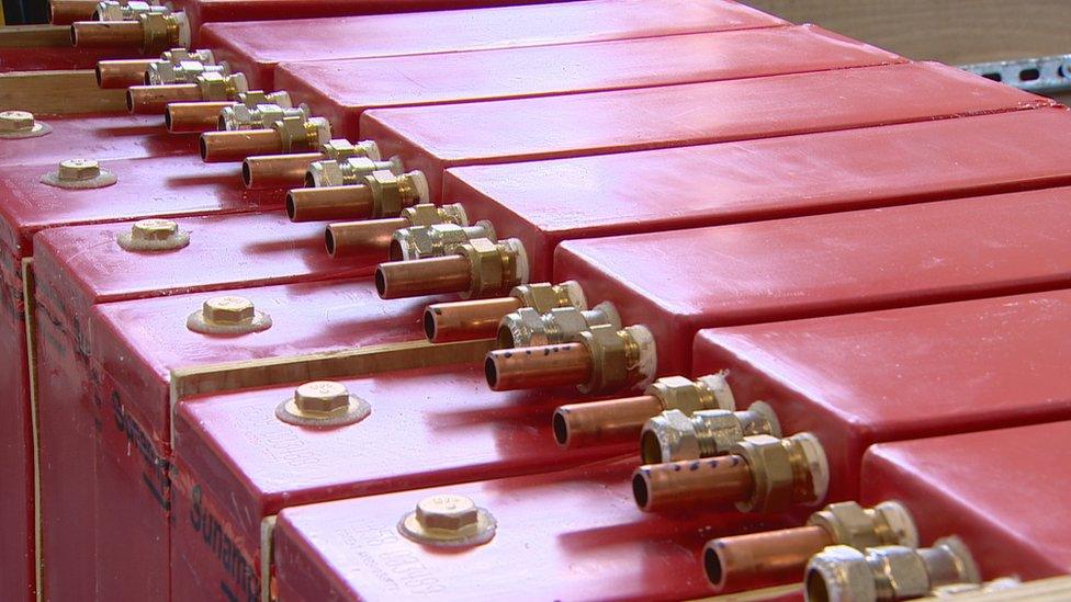 The red cells can be stacked together inside units like the one in Joan Maclean's cupboard