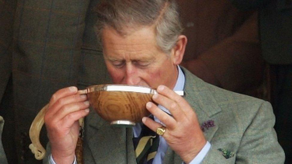 Prince Charles takes a drink of whisky from a Quaich during the 2005 Mey Games