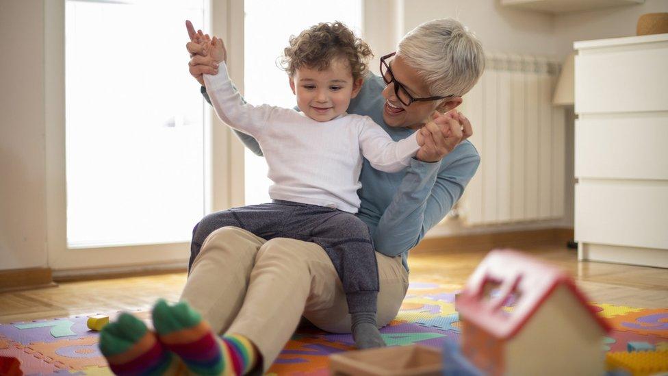 grandmother with grandchild