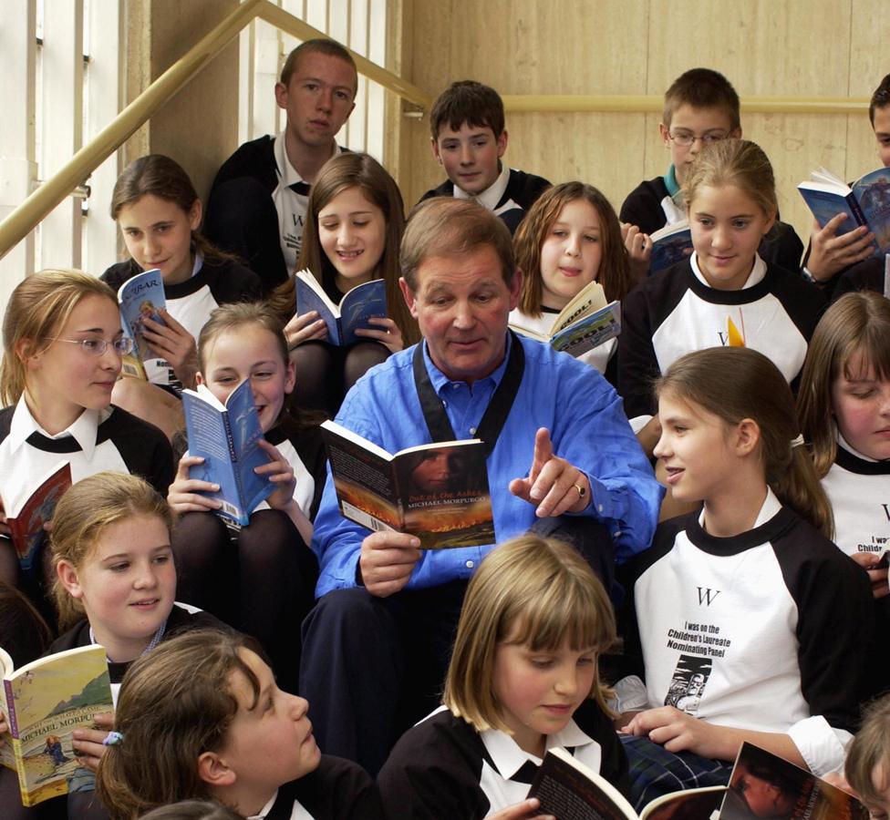 Reading to children in a book shop, in 2003