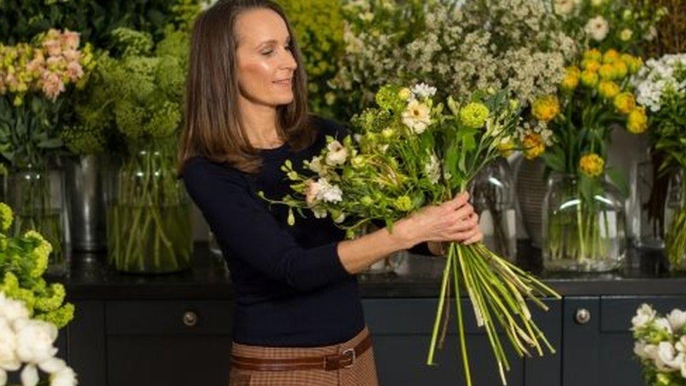 Philippa Craddock holding flowers