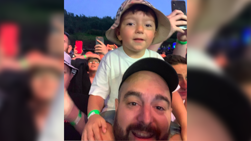 Barney and dad at a festival