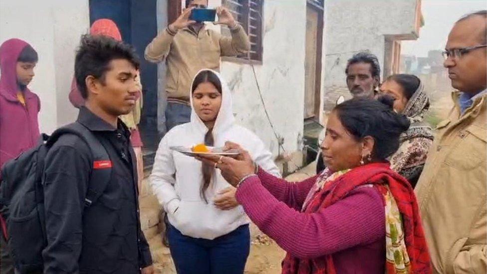 Neetu Kumar welcomes Bablu home while daughter Rakhi and activist Naresh Paras look on