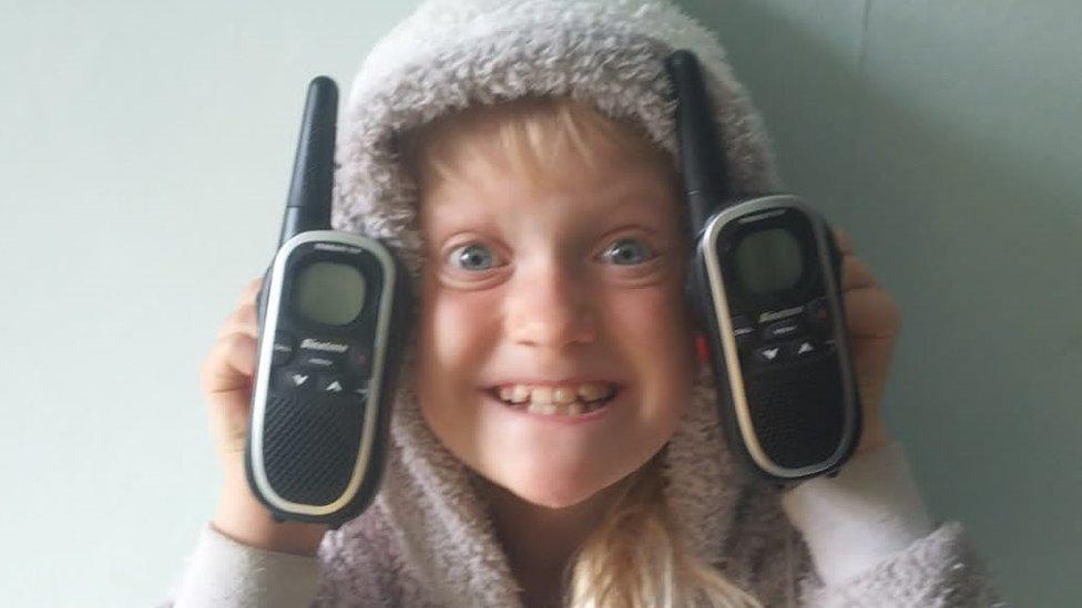 Child with walkie-talkies