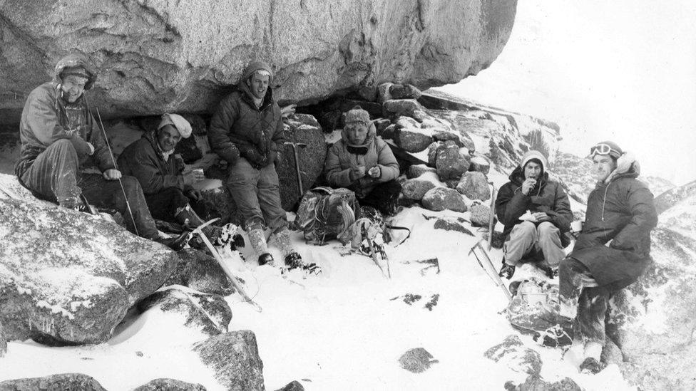 A search party at Shelter Stone Crag (Mollie to the right sitting with a white hat)