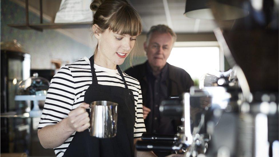 Woman working in a coffee shop