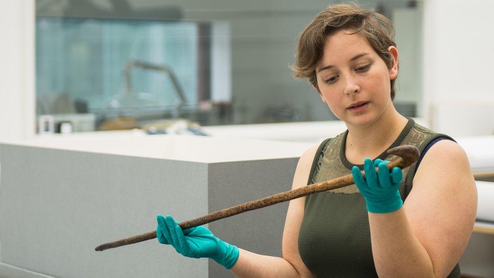 Collections Officer Sam Jenkins with the Peterloo cane