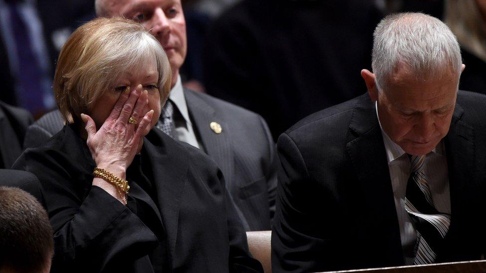 Judy and Dennis Shepard attend the interment ceremony for their son, Matthew Shepard