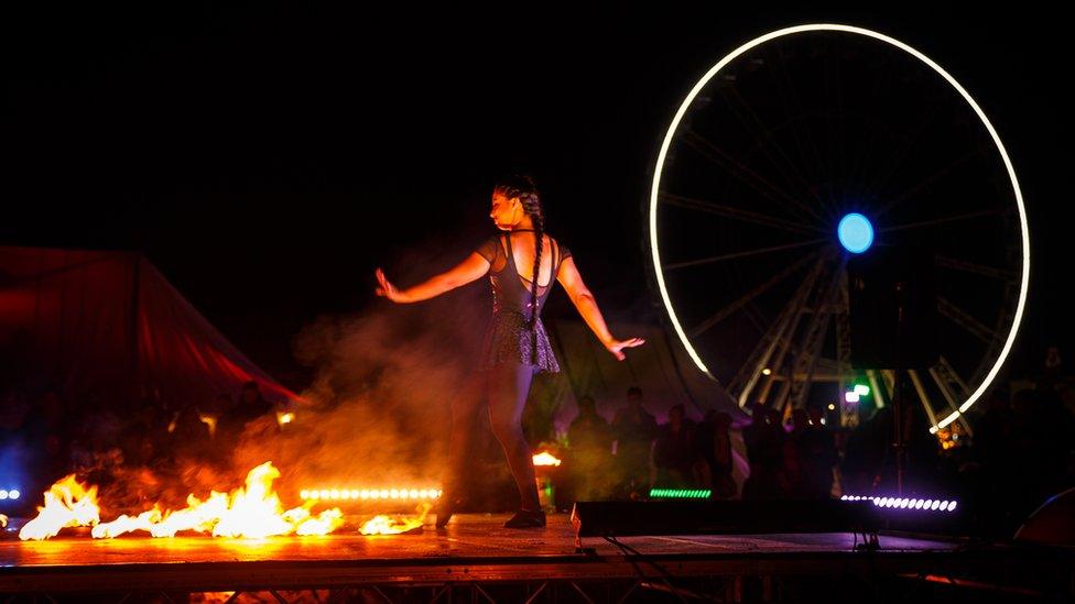 A woman dancing at the Fire on the Water festival in Great Yarmouth