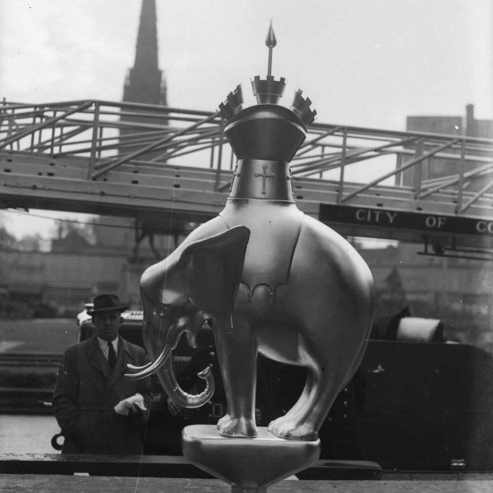 The city's Elephant and Castle statue ready to be raised on top of the standard in Broadgate