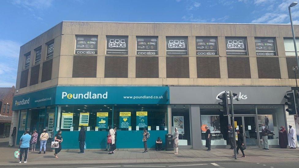 Shoppers in Kings Heath queuing for Poundland