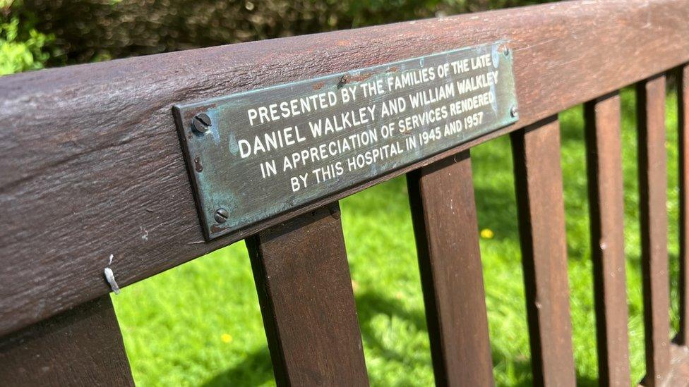 Plaque on one of the benches