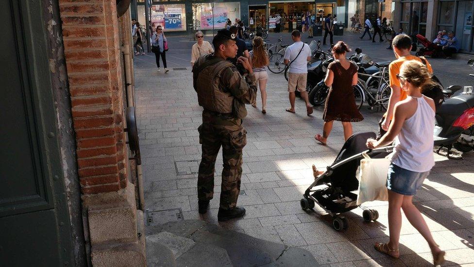 French soldier near church in Toulouse