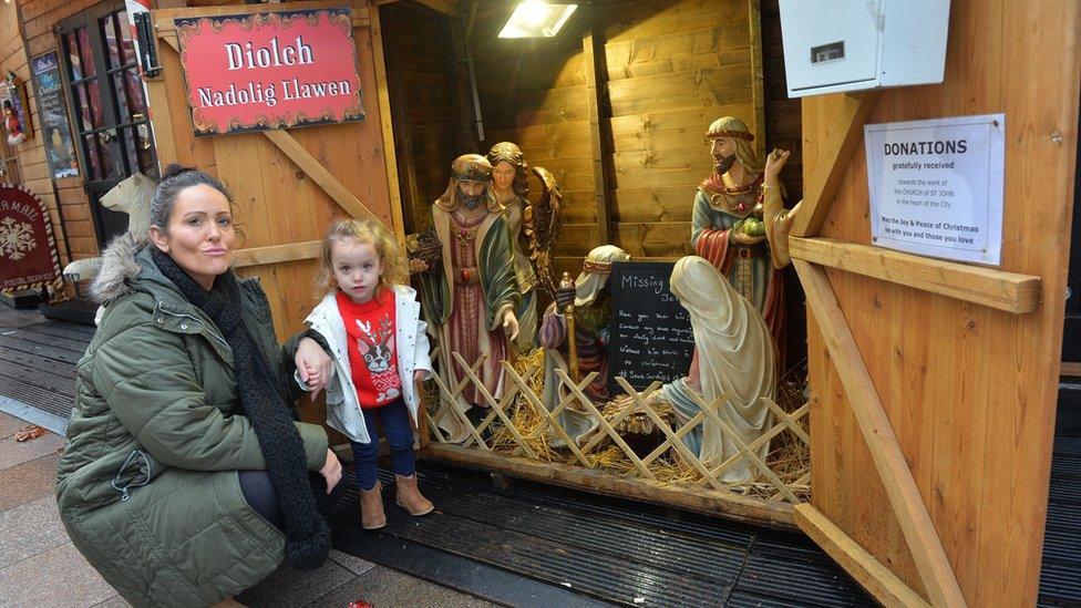 Maria Vella and her two-year-old daughter Lexi nativity with missing Jesus