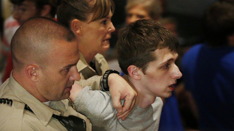 Michael Sandford is removed from a Donald Trump rally by police