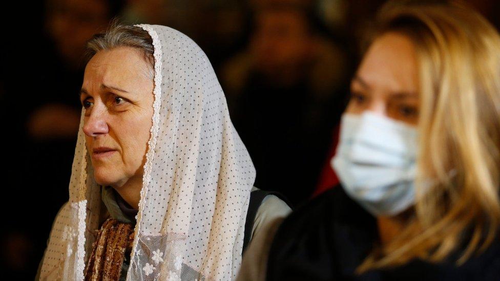 An orthodox believer mourns the late Serbian Patriarch Irinej in Belgrade, Serbia, 21 November 2020.