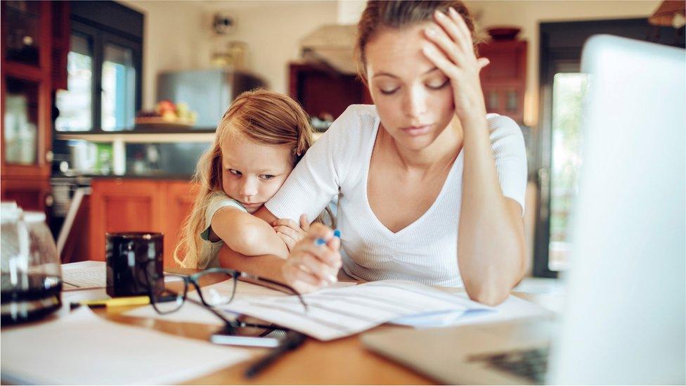 Woman working with child