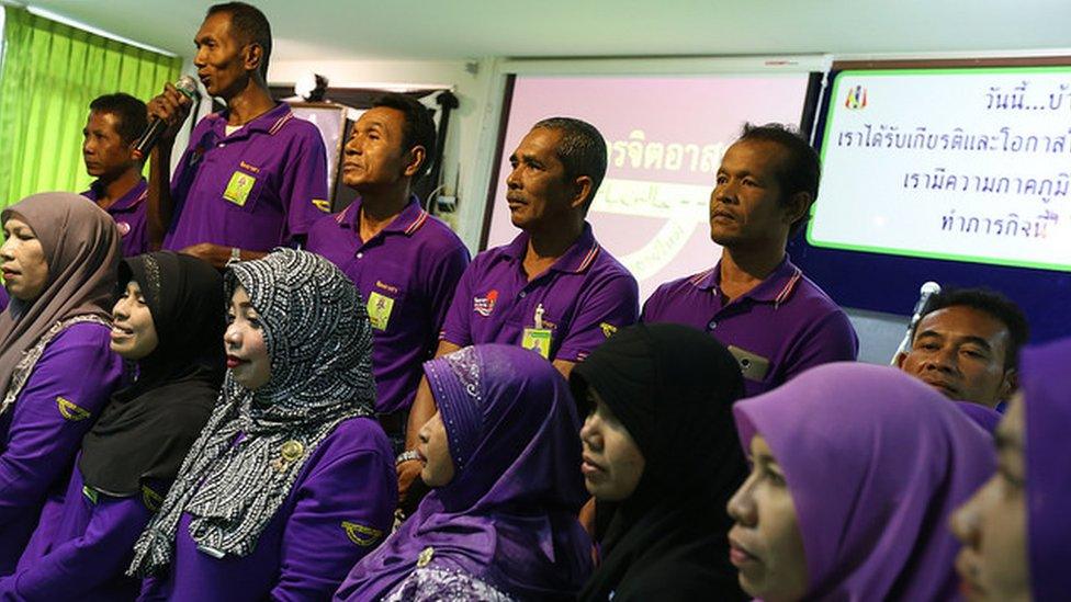 Yalannanbaru volunteers standing on the stage during a training session.