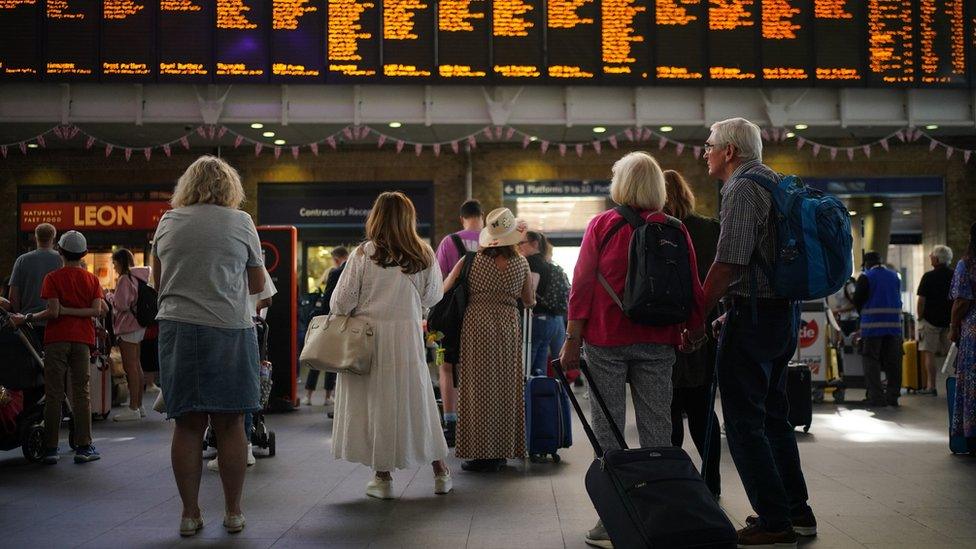 Passengers at London King's Cross station