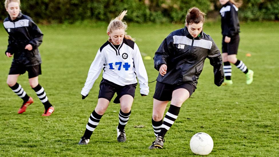 Women playing football