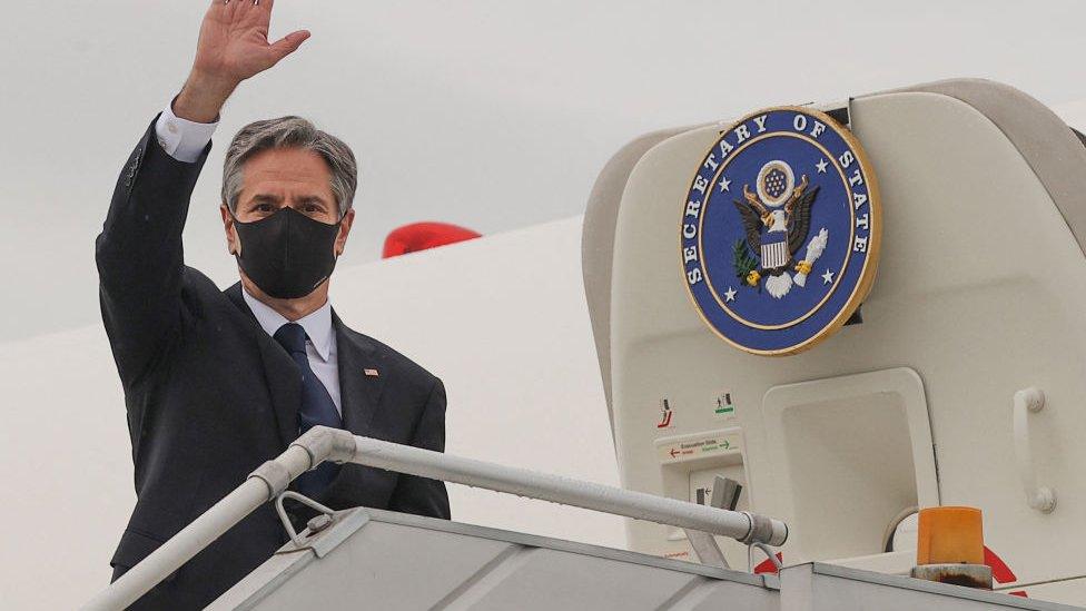 U.S. Secretary of State Antony Blinken boards his plane at New Delhi