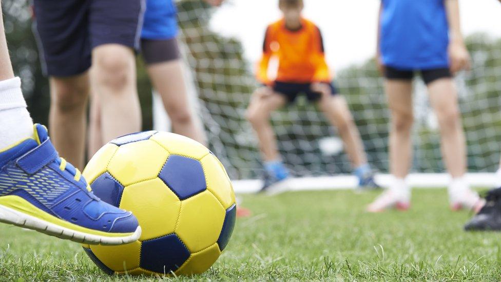 Children playing football