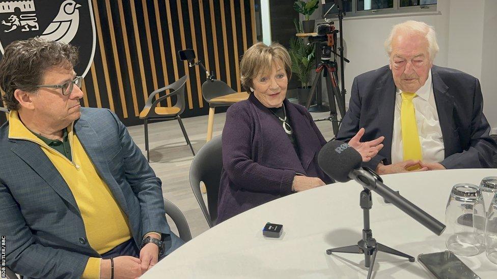 Mark Attanasio, Delia Smith and Michael Wynn-Jones sat at a table