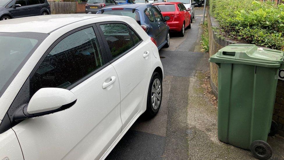 cars parked on pavement