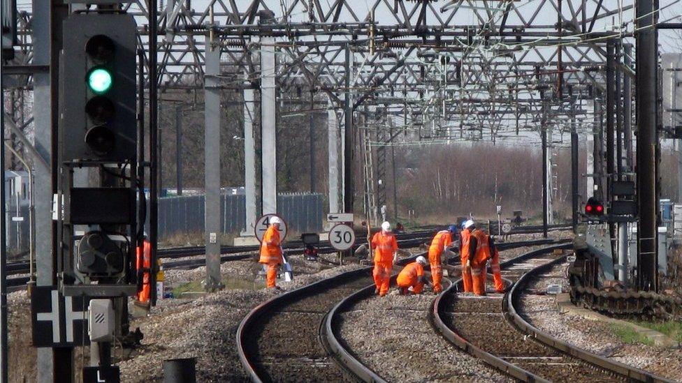 Workers on a railway track